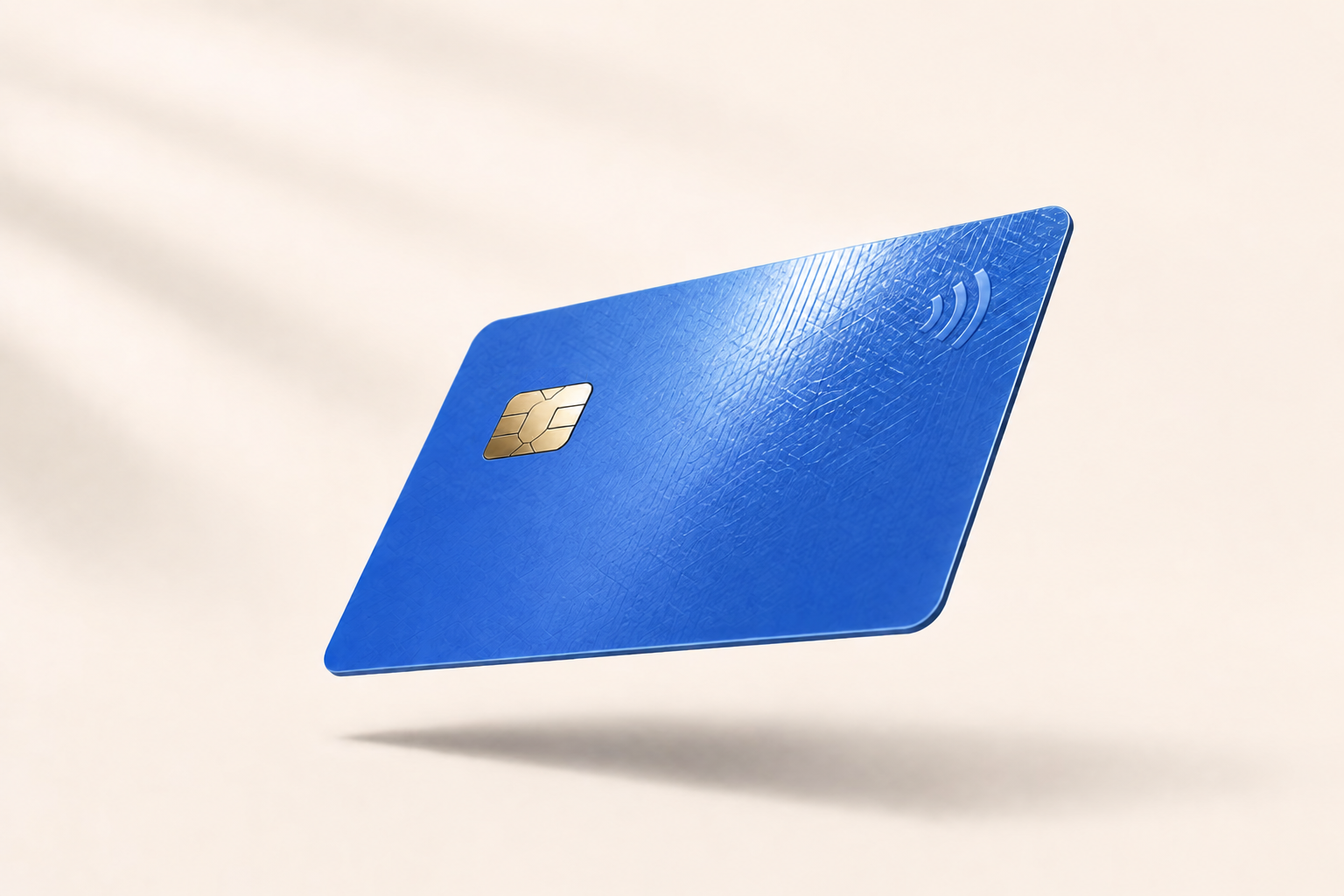 Illustrative blue smart card at an angle, with a gold contact chip and textured surface